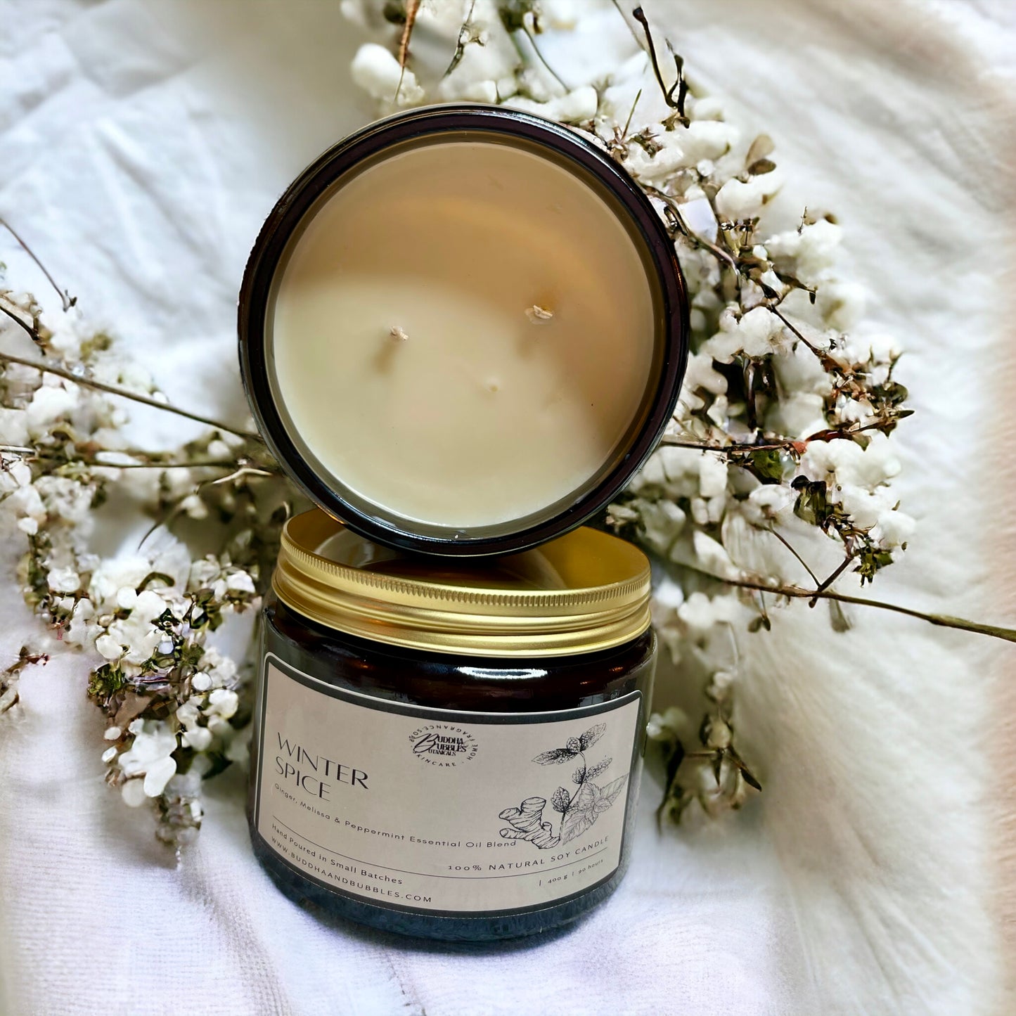 Luxury Xmas candle with essential oils in large amber glass jar