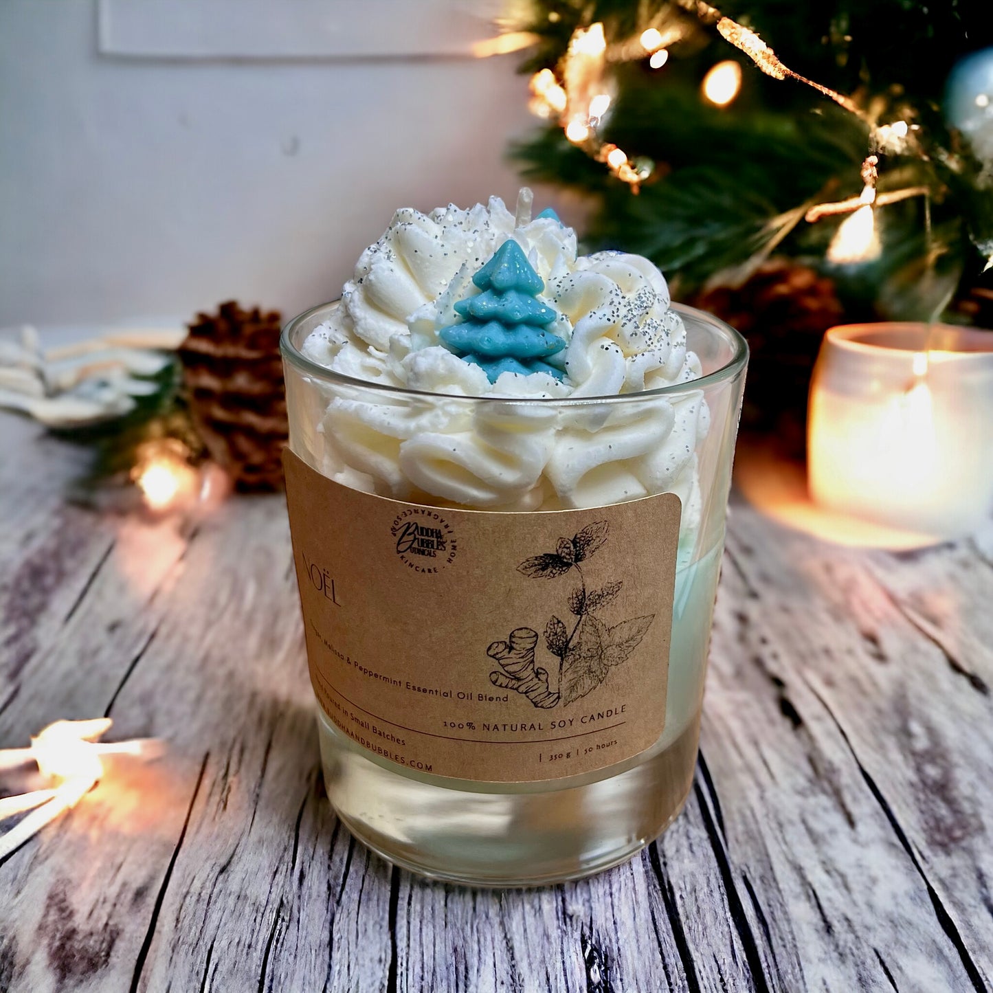 Christingle luxury whipped soy candle essential oils,topped with a decorative whipped wax swirl in a clear glass jar. Perfect for Xmas table decoration