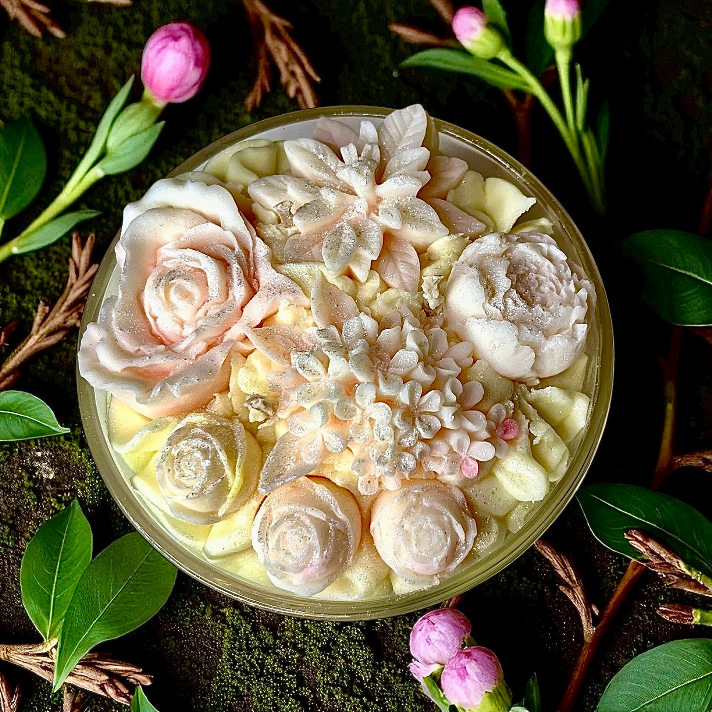 botanical themed triple wicked candle in a natural background on table