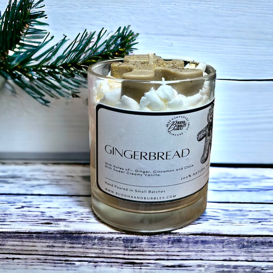 Christmas Candle with whipped wax Gingerbread man standing up on wooden bench