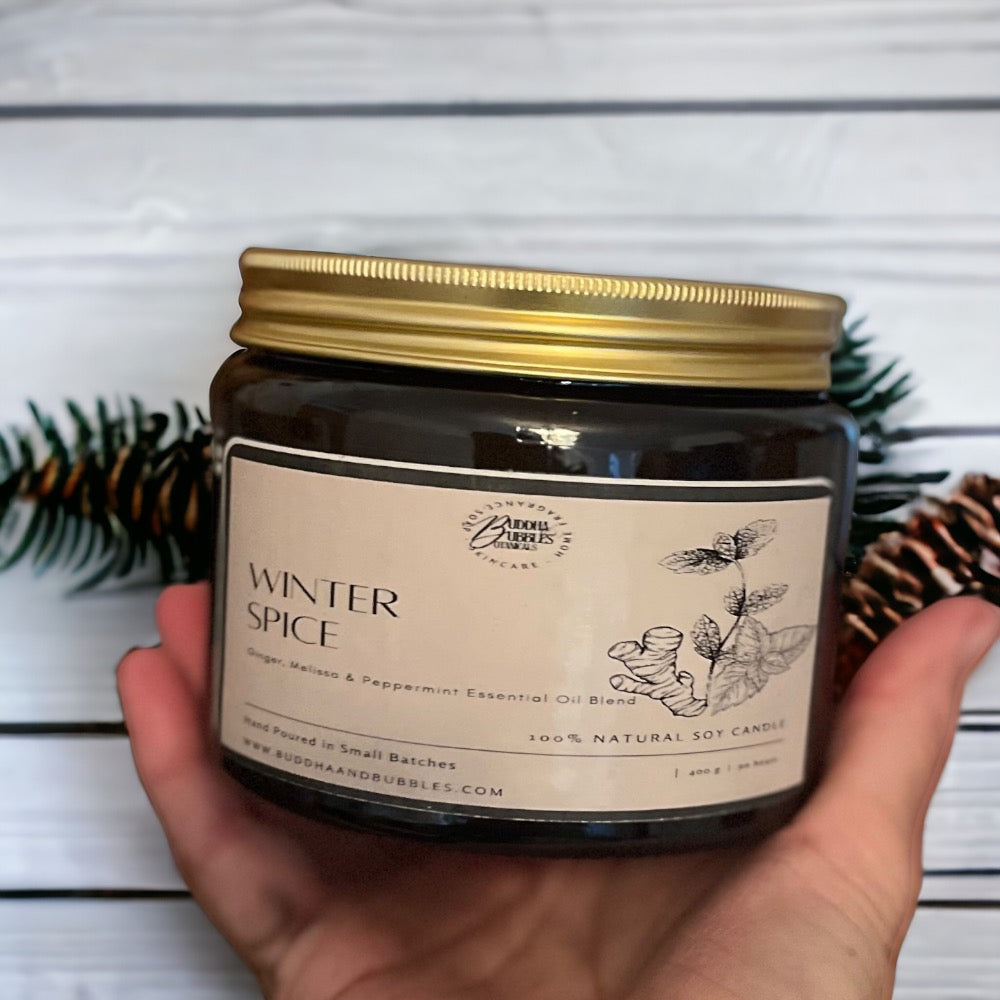 Luxury Xmas candle with essential oils in large amber glass jar