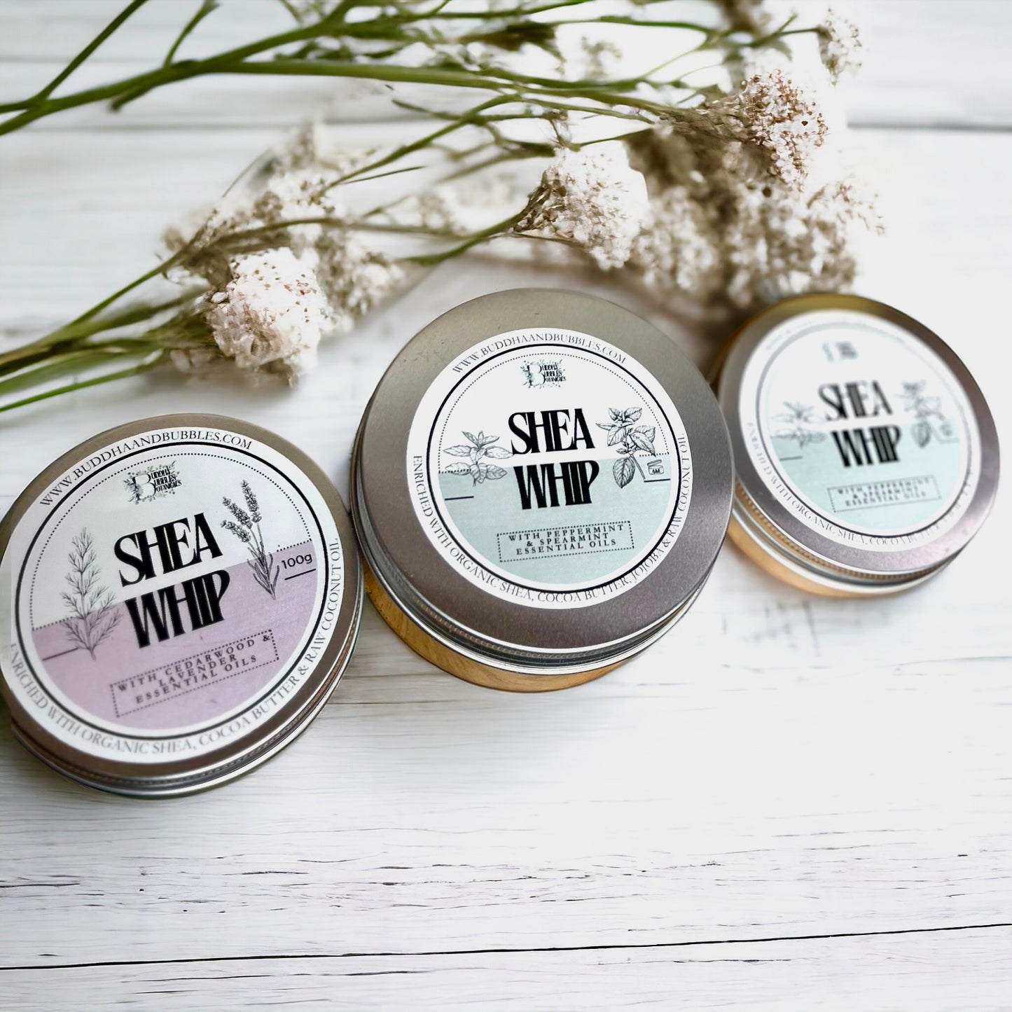 featuring three handmade shea whips in aluminium tins essential oils on a white background made by buddha and bubbles botanicals