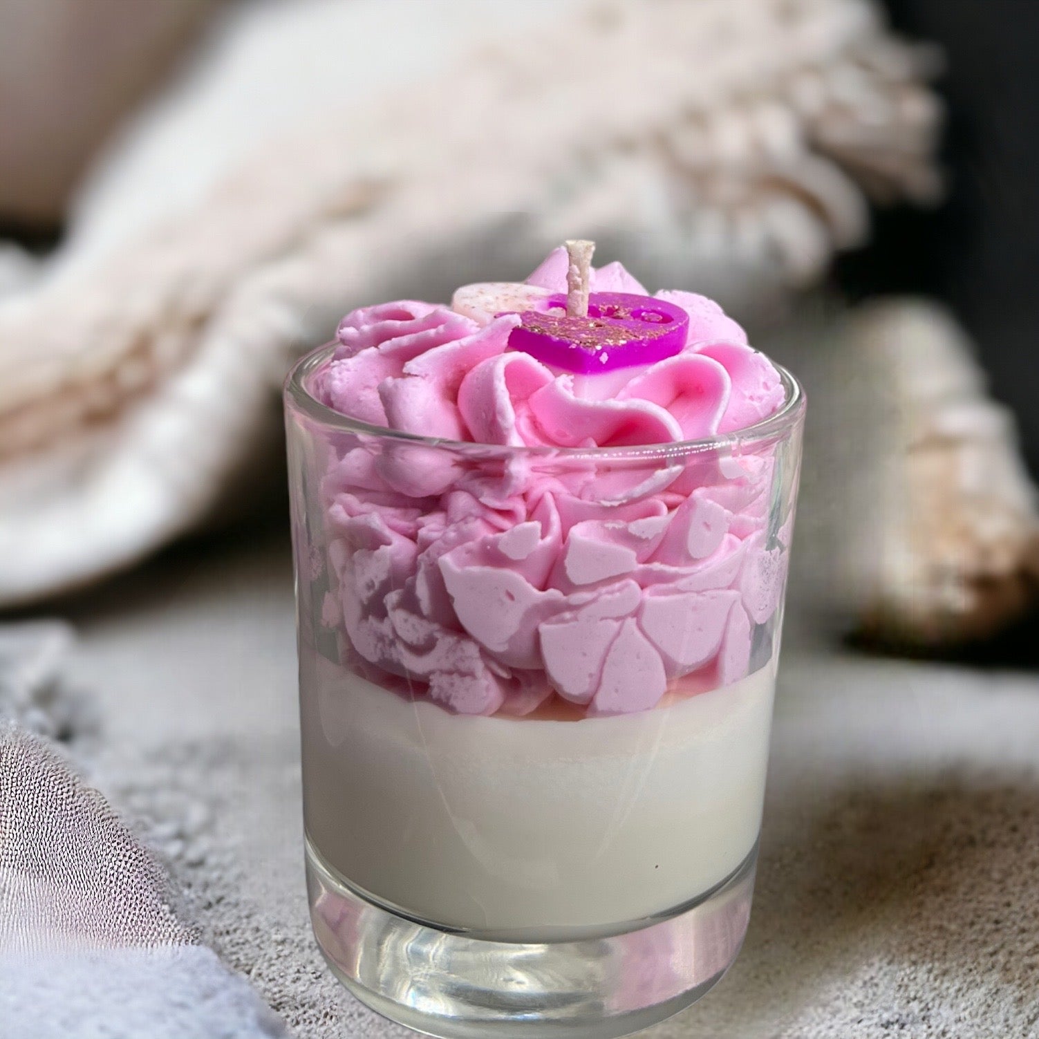 Whipped wax Luxury valentines candle fragranced with Dark Opium parfum pink in colour 