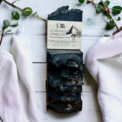 Soap bar exfoliating with activated charcoal, oud and bergamot parfum 