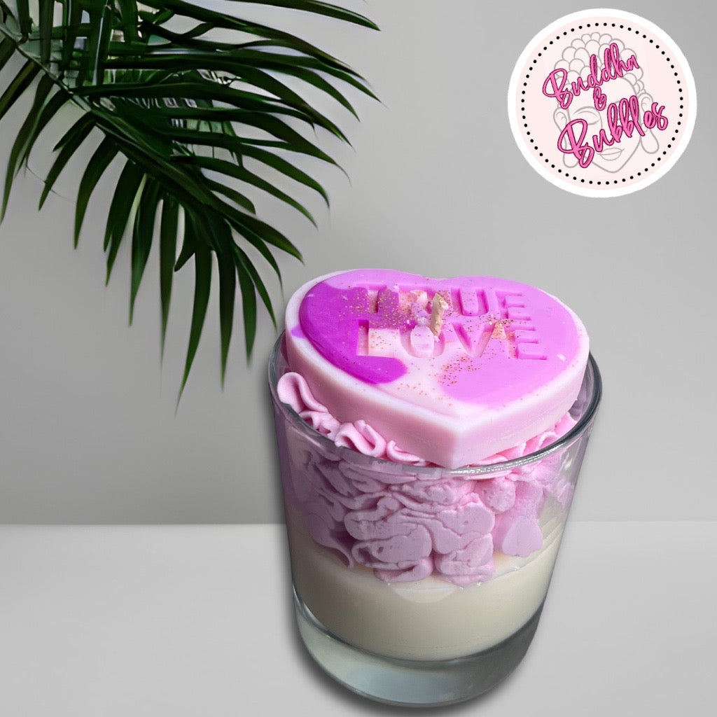 Whipped Wax Luxury valentines candle fragranced with Dark Opium parfum pink in colour with large love heart 