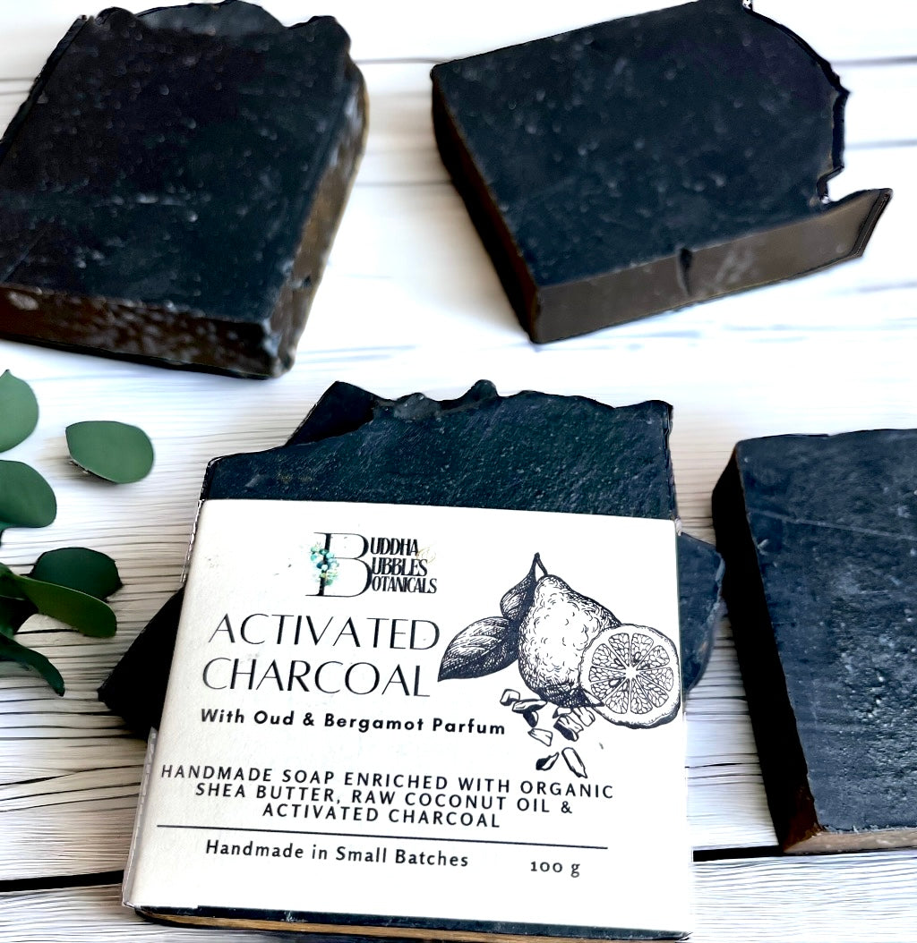 Soap bar exfoliating with activated charcoal, oud and bergamot parfum 