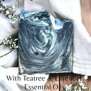 Open image in slideshow, Soap Bar with Activated Charcoal and Teatree and Lavender Essential Oils enriched with Shea Butter
