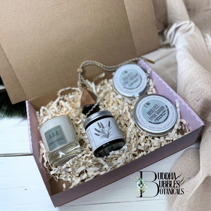 Buddha Bubbles Botanicals beauty and home fragrance product set in a box with Buddha and Bubbles Botanicals branding