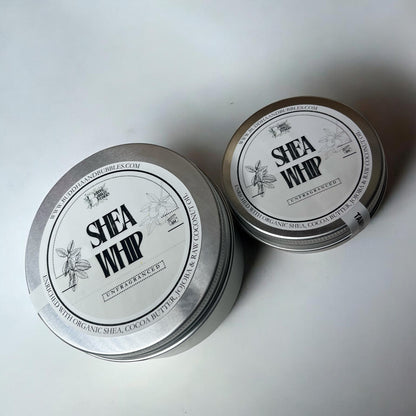 Two tins of Shea Whip on a light gray background
