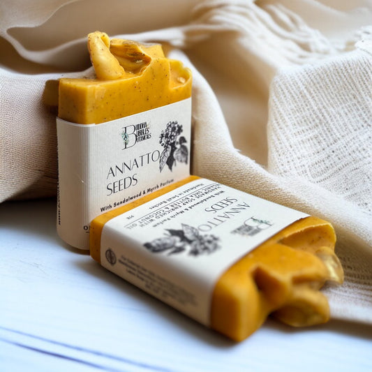 exfoliating soap bar naturally coloured with annatto seeds