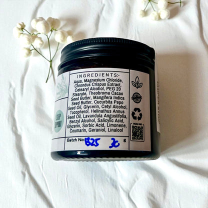 Magnesium Jar with Irish Moss Seaweed with a label showing ingredients on a white fabric background