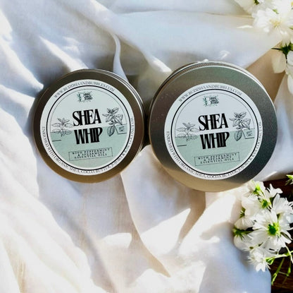 showing a medium and large size tin of shea whip body butter made by buddha and bubbles botanicals