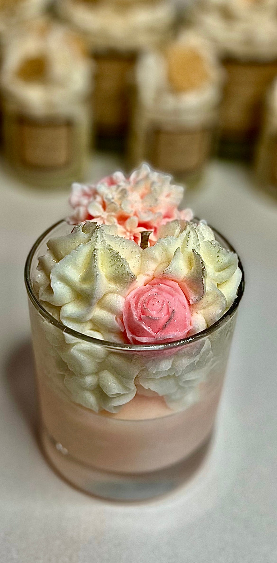 handmade dessert candle with whipped wax piping and wax melt embeds with snow angel parfum