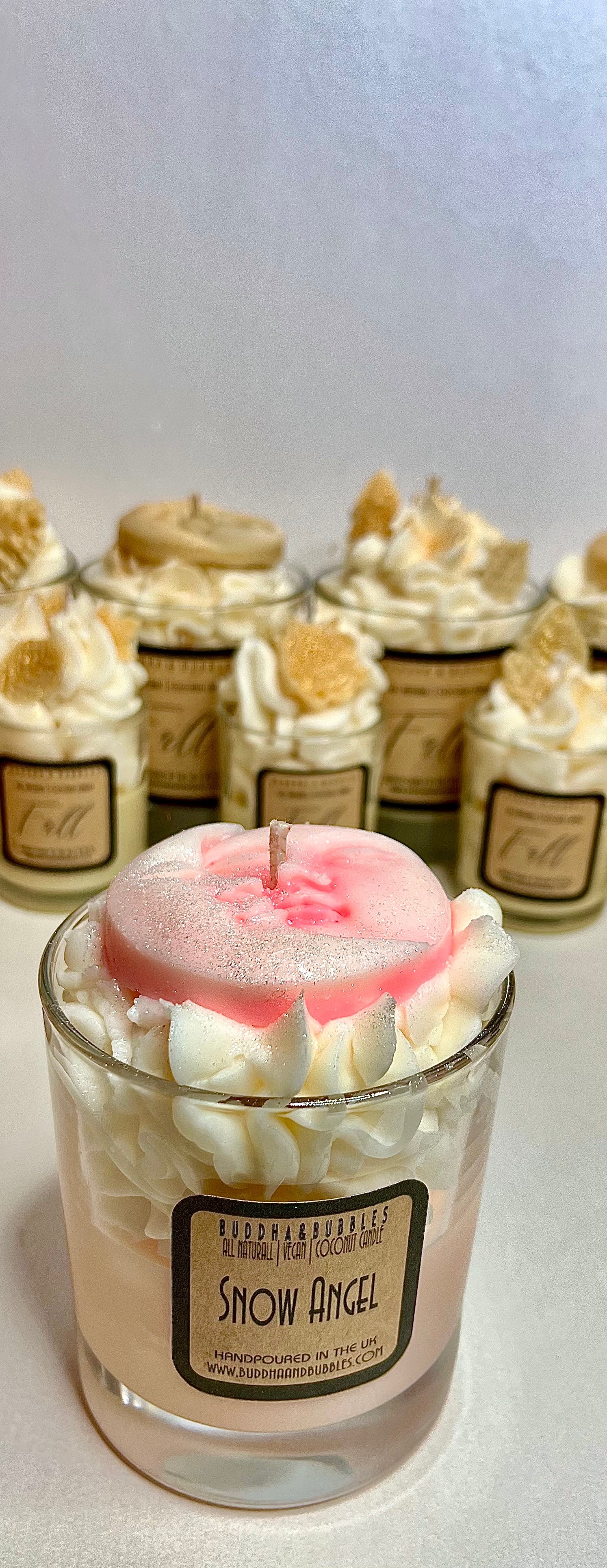 handmade dessert candle with whipped wax piping and wax melt embeds with snow angel parfum